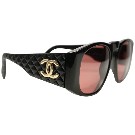 chanel black sunglasses with gold logo